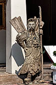 Bangkok Wat Pho, chinese style door guardians of the gallery of the eastern courtyard of the temple compund. 